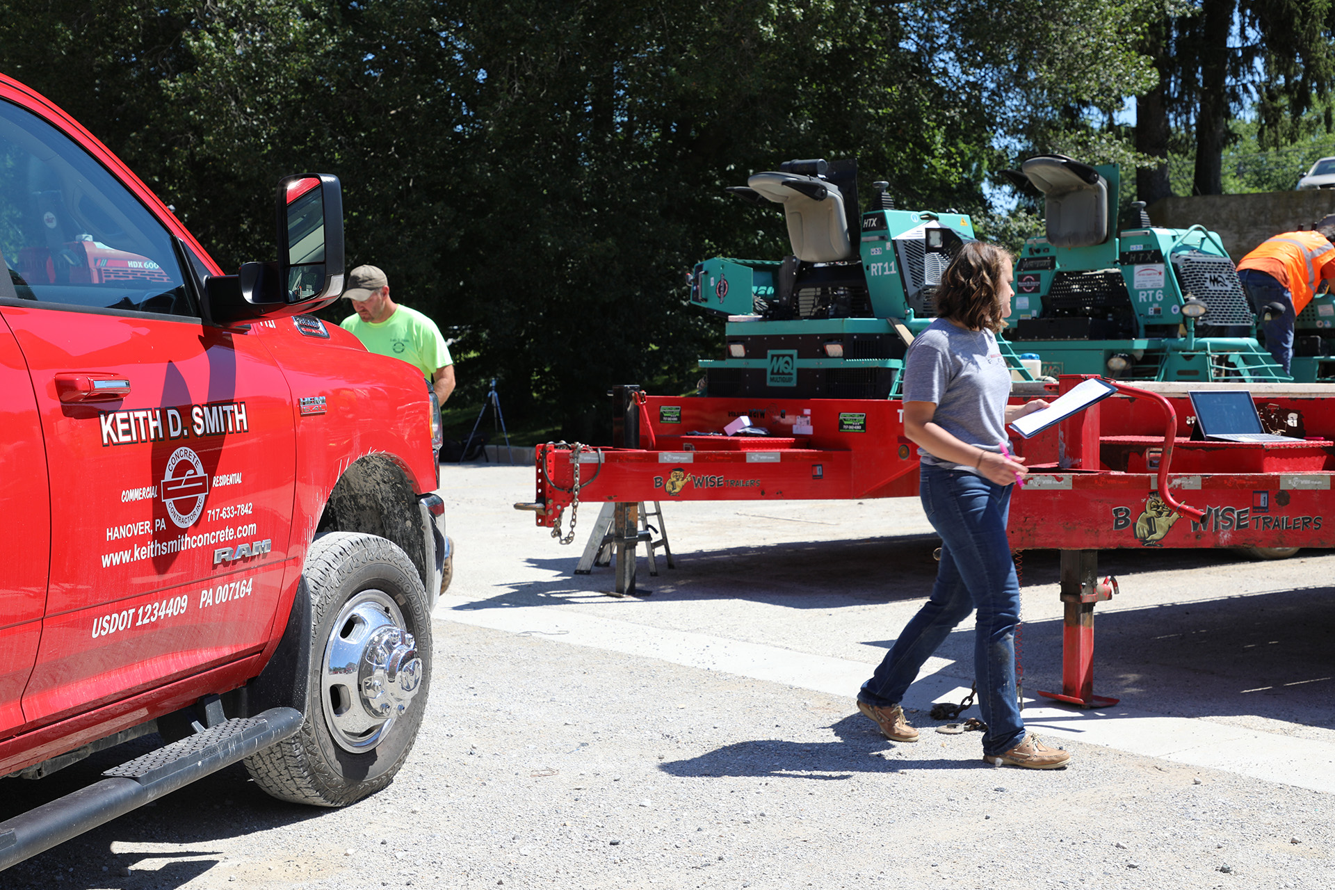 Abby walking around the Rental Works yard checking out the equipment tracking