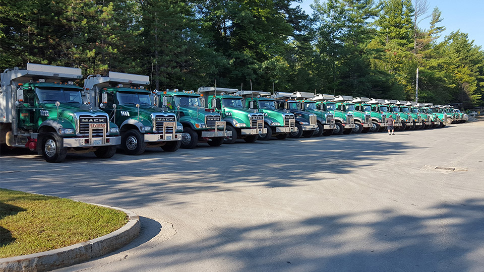 Lineup of Severino trucks in a parking lot