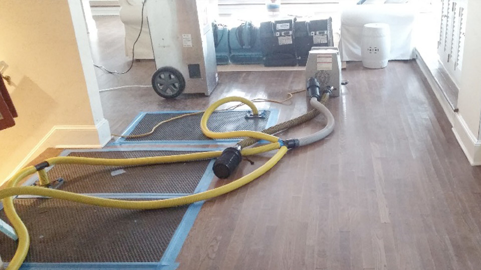 Selection of equipment from the Air American Integrity fleet on top of hardwood floors
