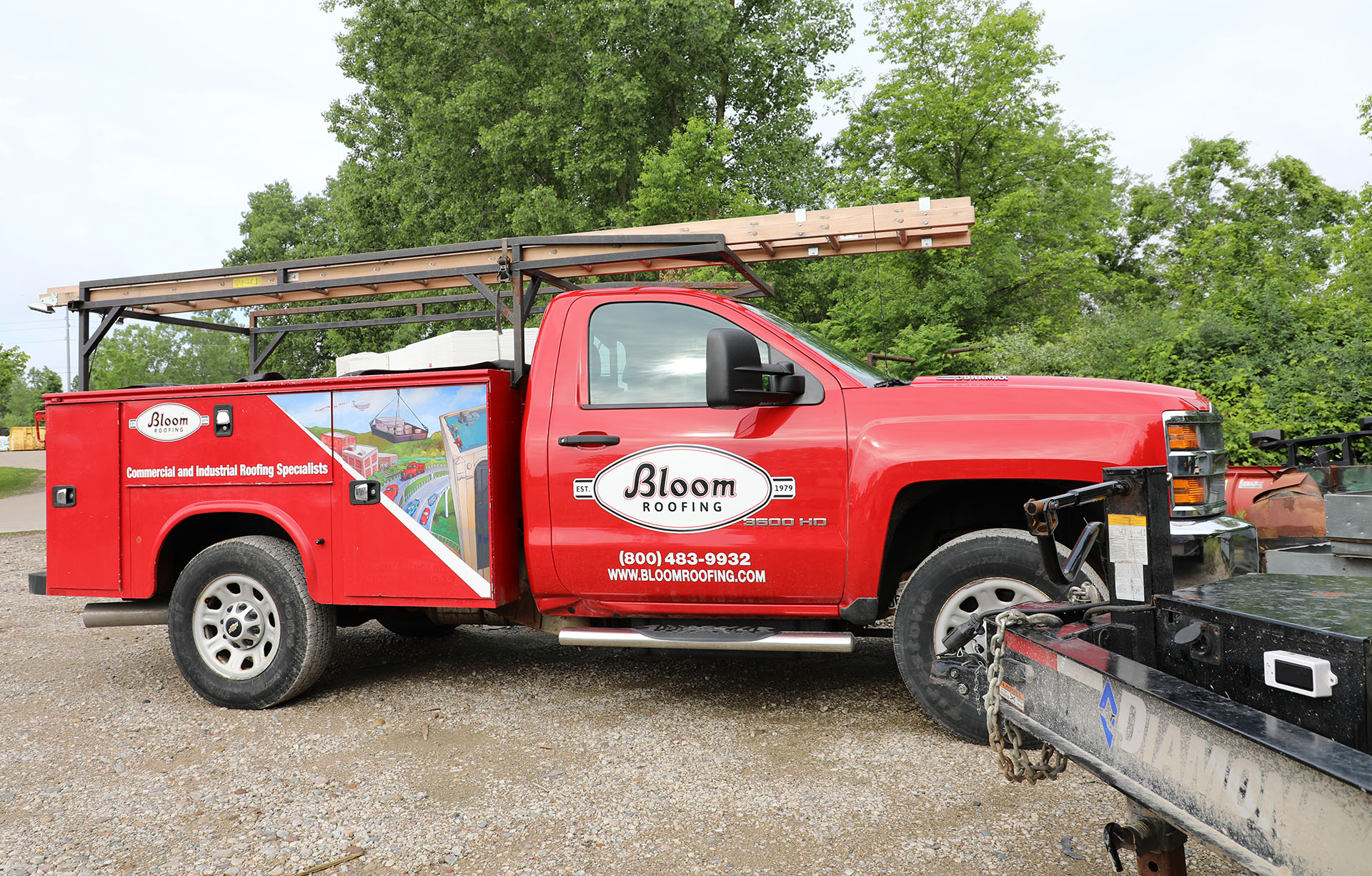Bloom Roofing Truck with a TennaMINI Solar on a trailer
