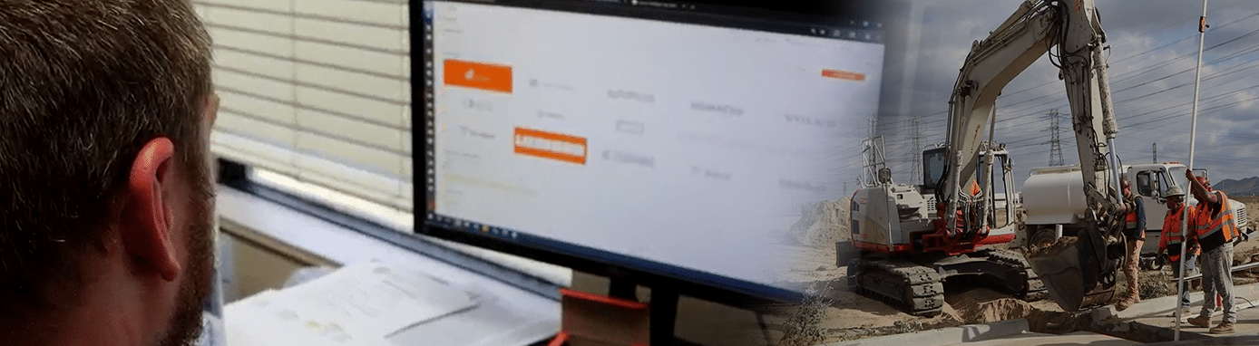 Man sitting at a computer looking at Tenna software dashboard and construction software integrations.