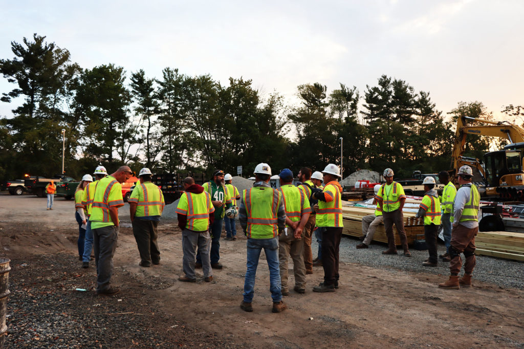 Group of Construction Workers at a Safety Meeting