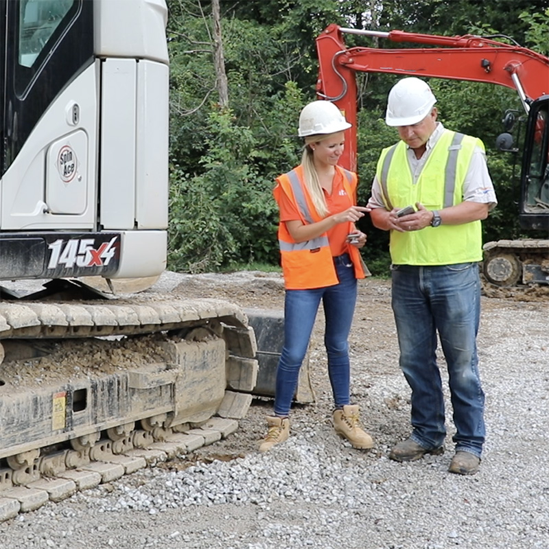 Gina in the field with a customer