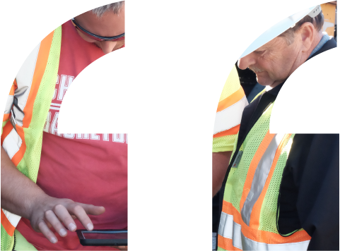 Two workers in the field using the Tenna App